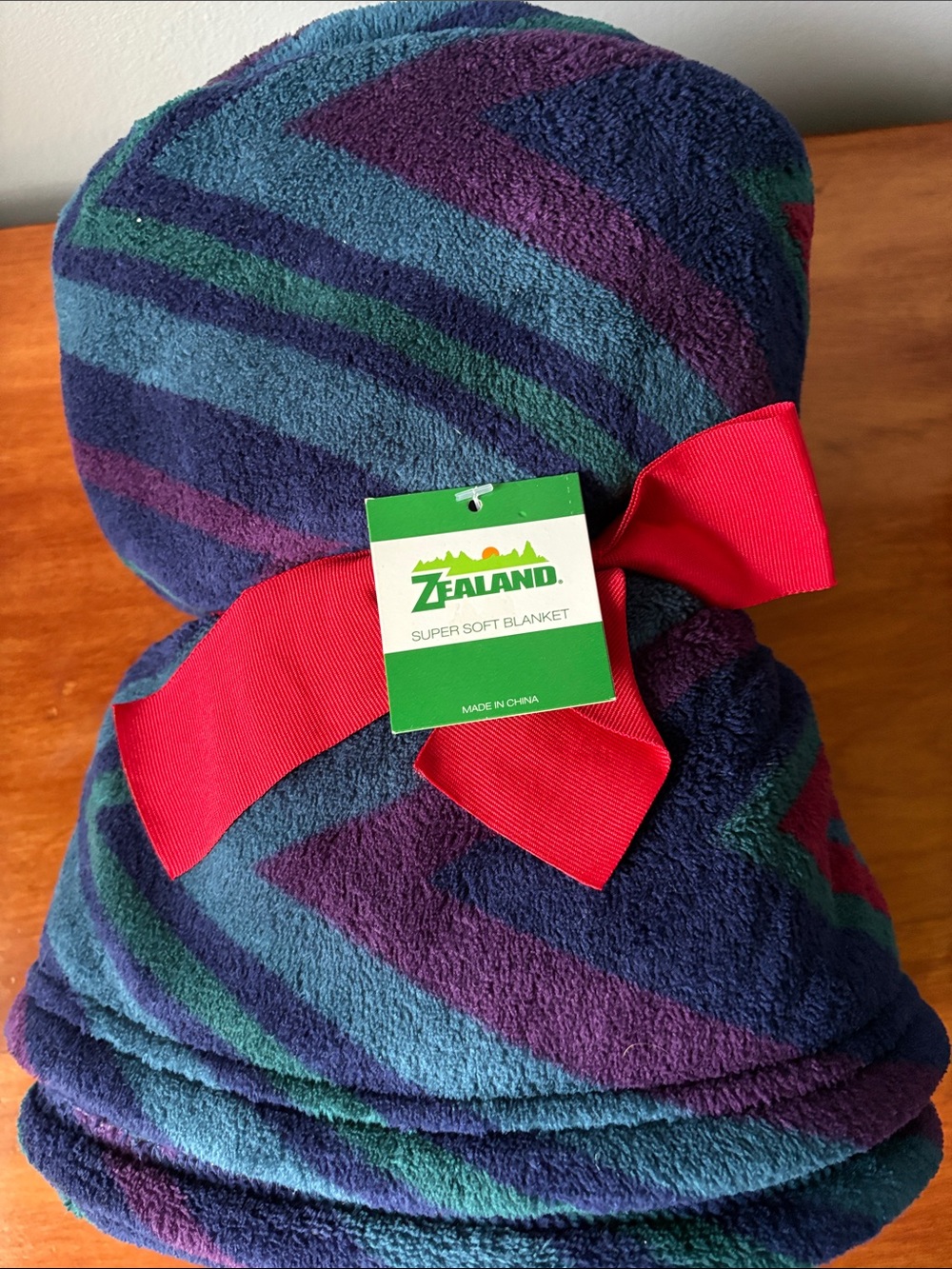Plush Striped blanket in Blue, Purple & Green